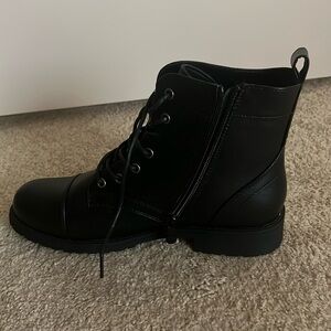 Black combat boots; size 8